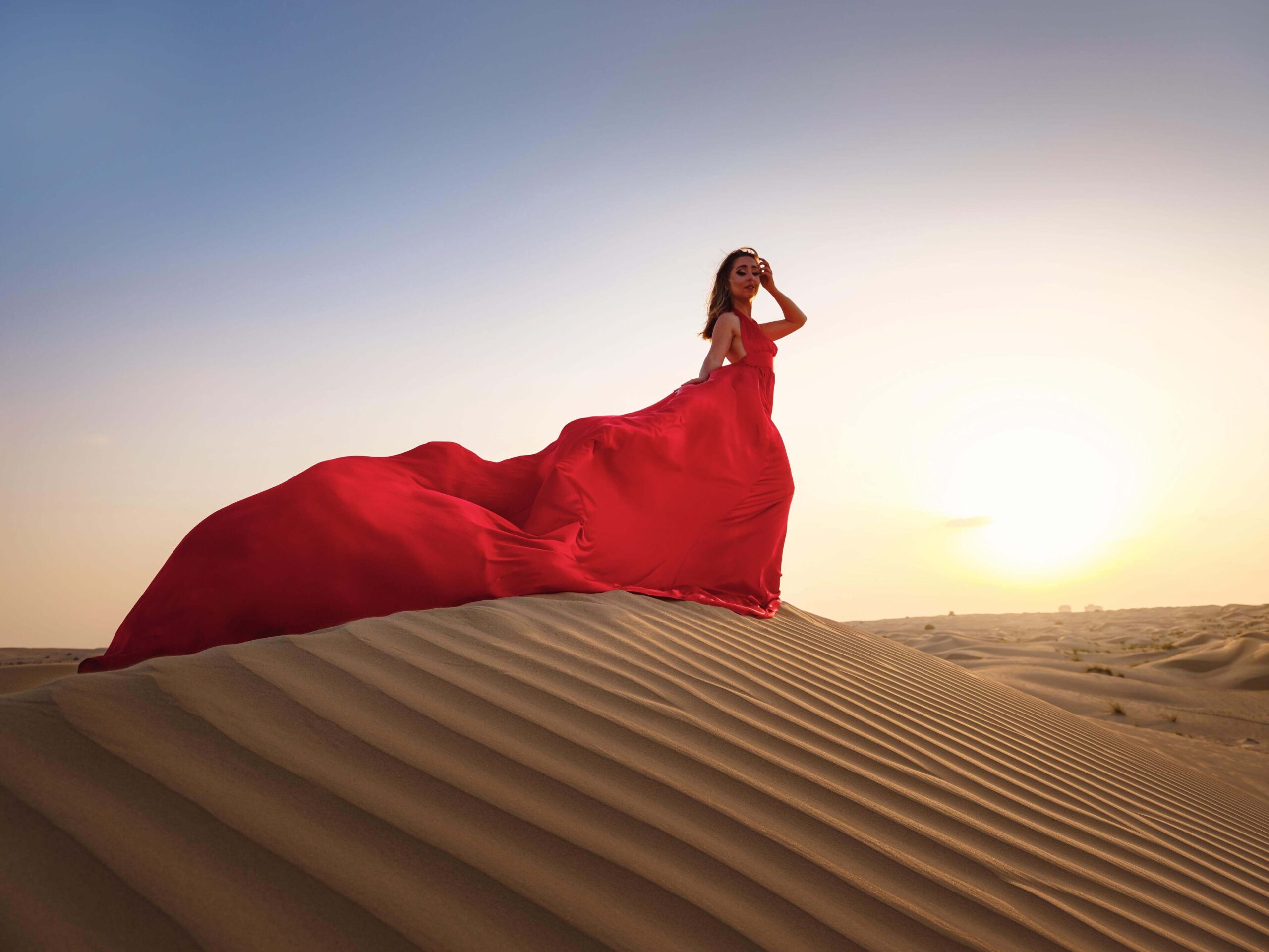 Beautiful woman in an elegant dress posing for a photoshoot in Dubai