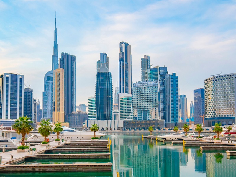 A scenic view of Dubai city showcasing iconic landmarks and modern architecture during a city tour in 2024