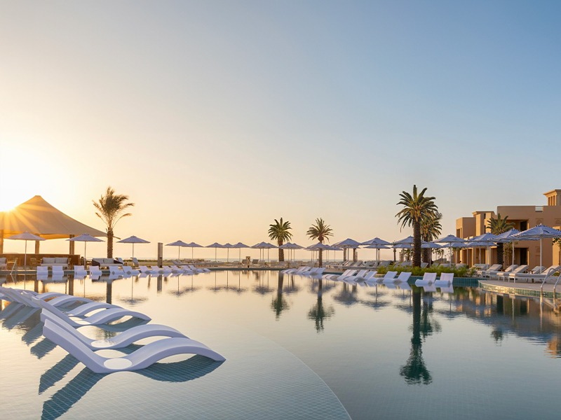 Sofitel Al Hamra Beach Resort's Luxurious Seaside Oasis with Pristine Beachfront and Elegant Amenities